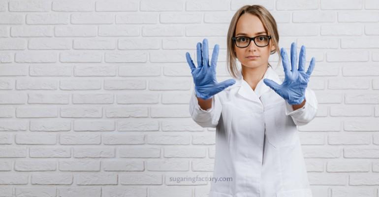 Nitrile gloves is the best choice for a sugaring practitioner